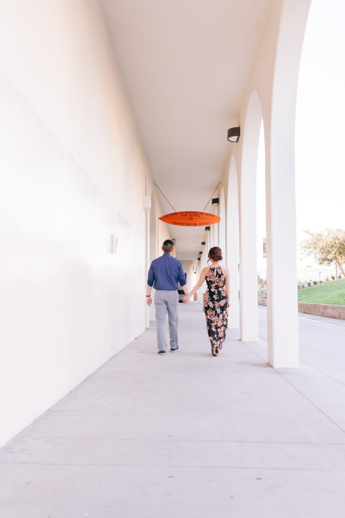 couple classroom building holding hands