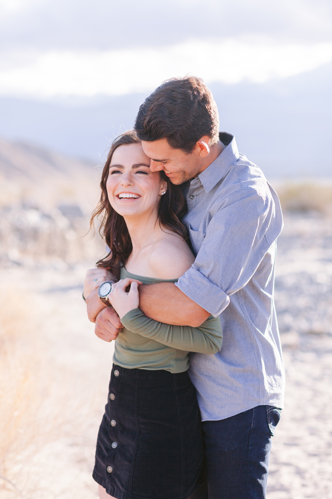 indio couple laughing engagement session style guide
