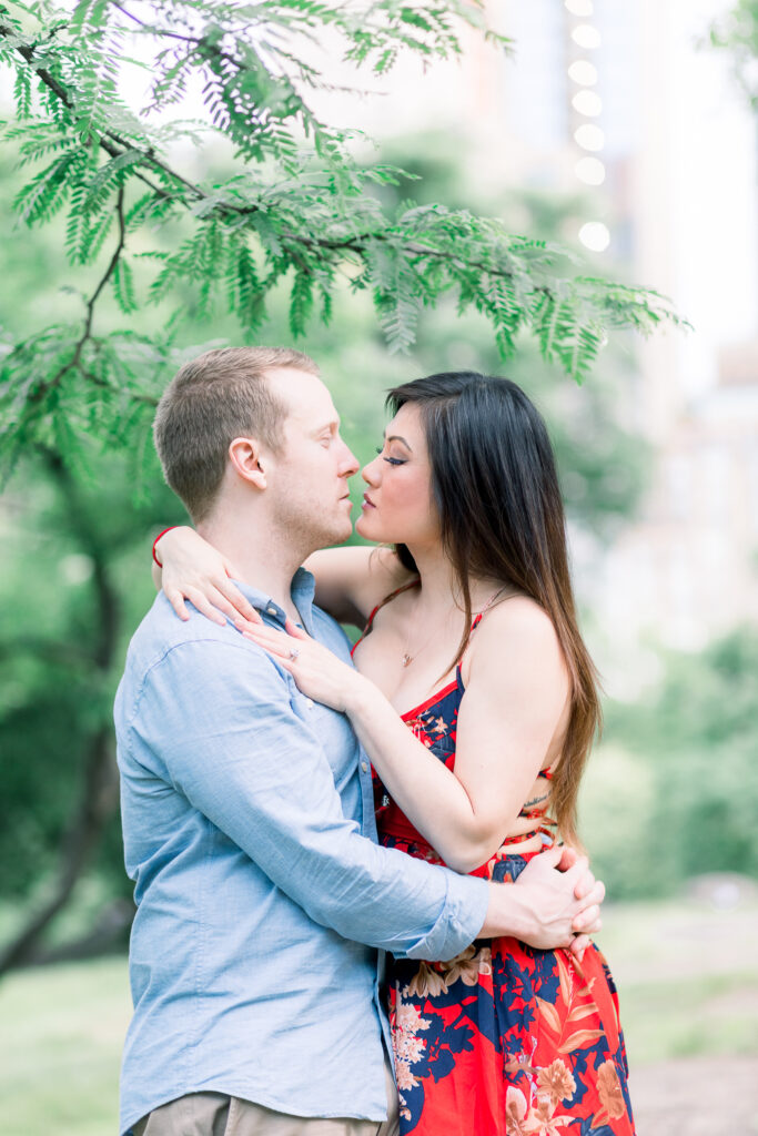 central park engagement session couple kiss