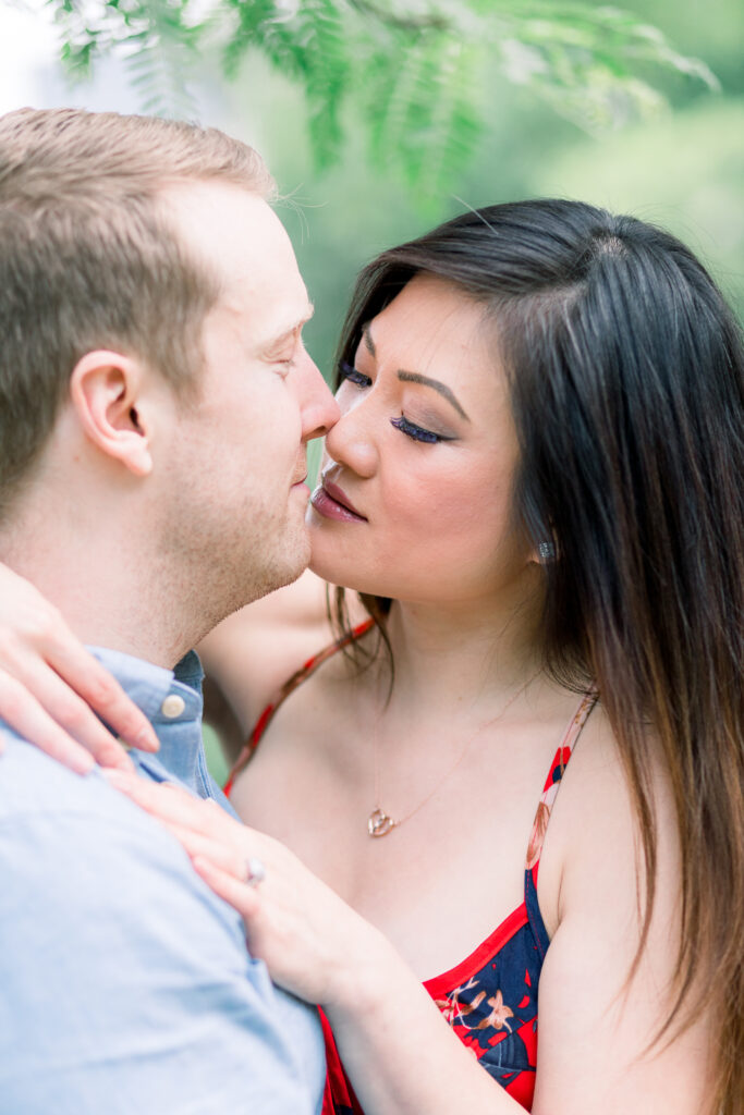 central park engagement session couple kiss