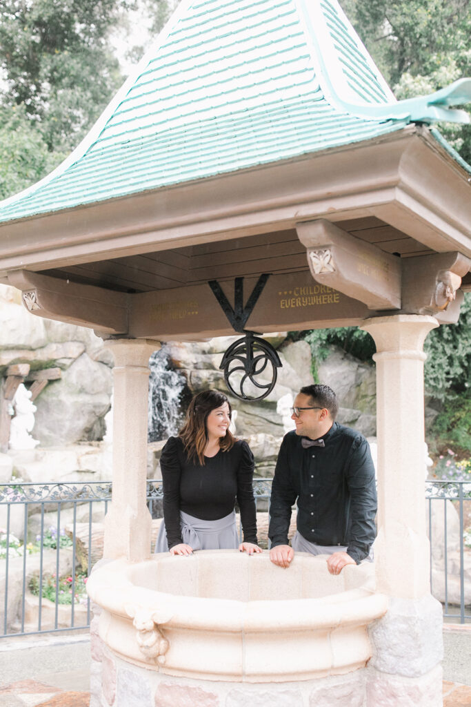 disneyland engagement photos wishing well